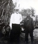 N.E. Hansen and Manchu mountain farmer in Myfun in northern China in 1924 by South Dakota State University