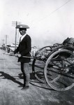 Rickshaw man and his rickshaw at Yokohama, Japan in 1924 by South Dakota State University