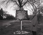 Dr. Crothers standing by a South Dakota State College sign, 1951 by South Dakota State University