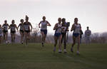 South Dakota State University 1998 Jackrabbits women's cross-country running team at a meet by South Dakota State University